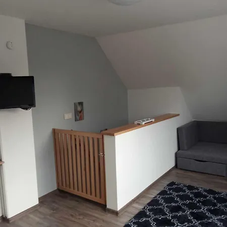 Szarkaláb Apartman *